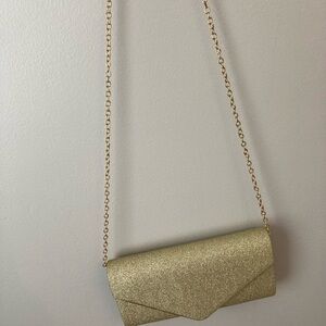Gold clutch bag